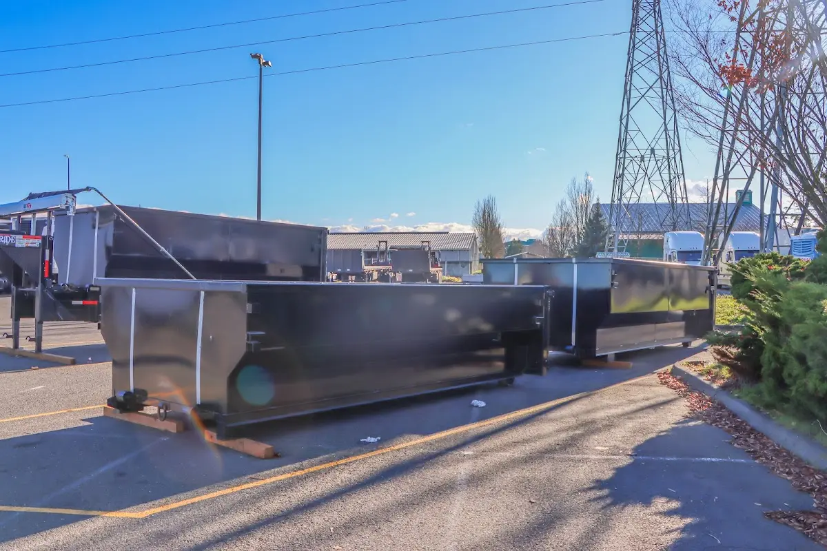 Roll-off dumpster ready for waste disposal at job site for 2 Yard Dumpster Rental in Ridgewood village